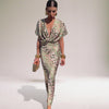 Sukienka damska z nadrukiem | Kobiecy design i płynna forma | Elegancki look na dzień i wieczór